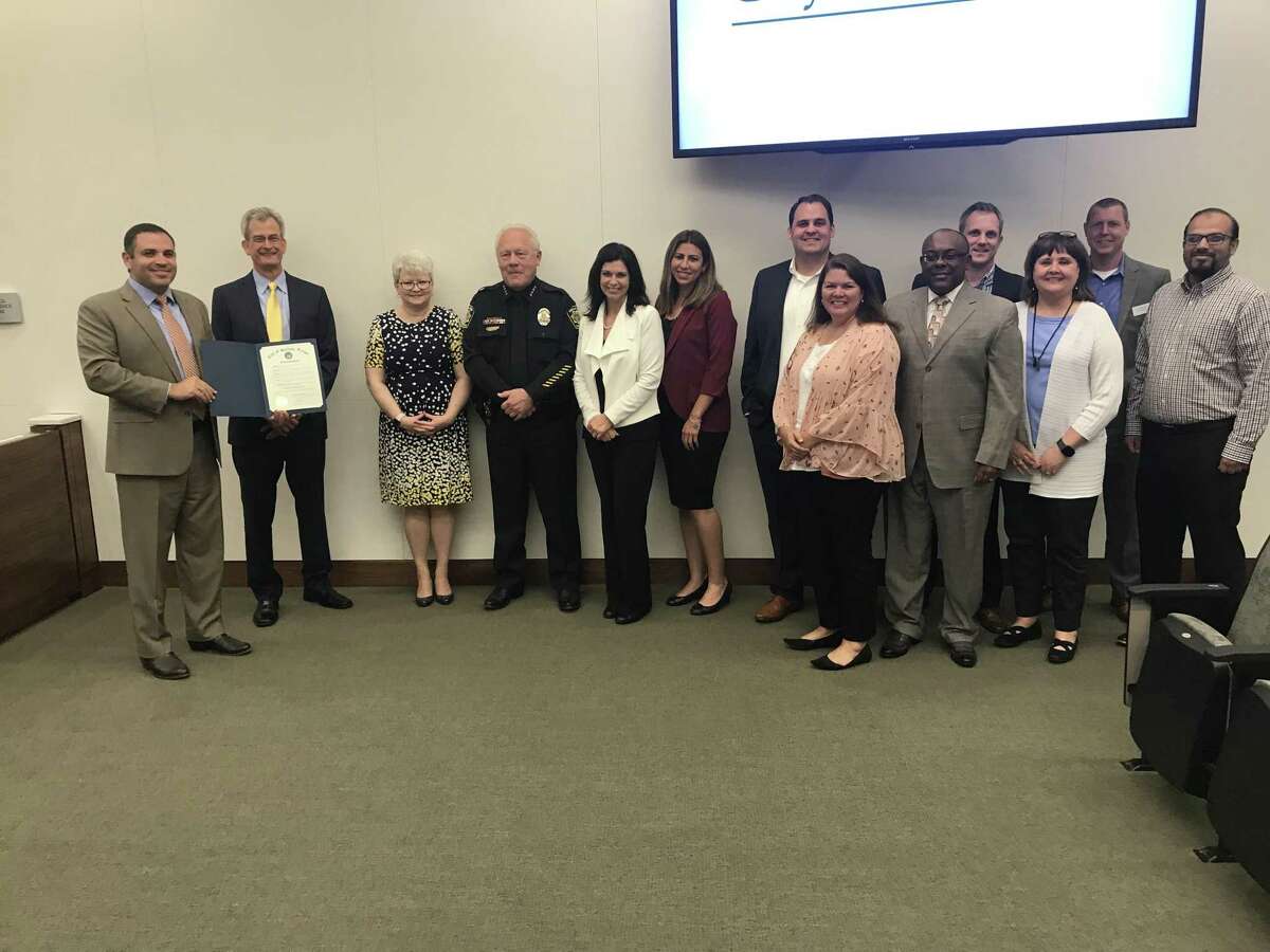 Bellaire Mayor Andrew Friedberg (left) honored the contributions of the city employees as he proclaimed May 5-11 as Public Service Recognition Week at the city council meeting on Monday, May 6.