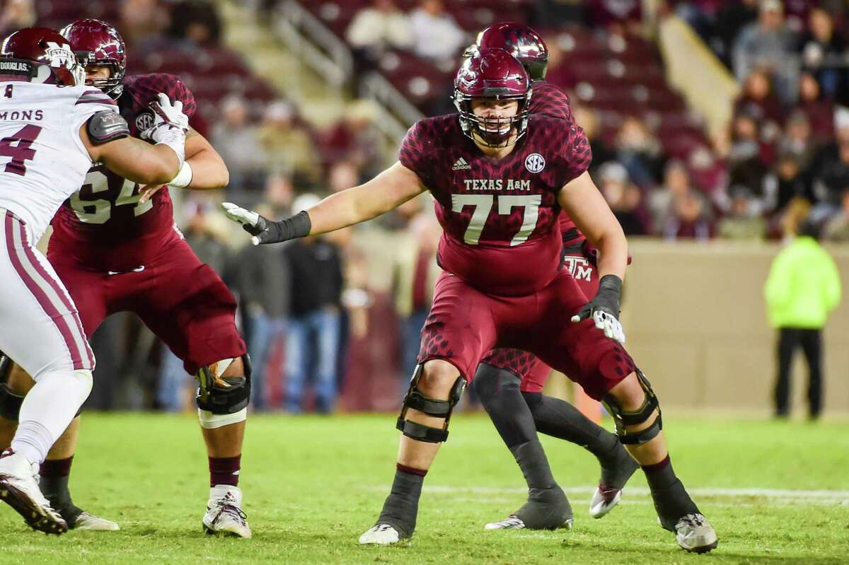 Ryan McCollum (77) battled a back injury in 2019 but should get first shot at center this season.