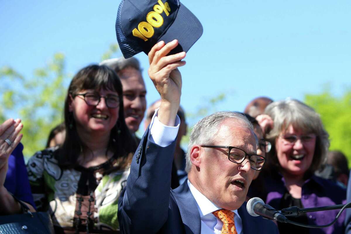 Washington State Governor and presidential candidate Jay Inslee signs five climate change bills into law that will reduce carbon emissions, decrease pollution, boost jobs and increase public health.  He had a good reception in May, but ranks 5th in a poll of presidential preferences of Washington State Democrats. 