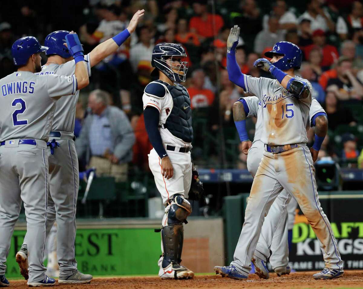 Kansas City Royals Whit Merrifield (15) celebrates his grand slam home run off Houston Astros relief pitcher Framber Valdez (59) during the seventh inning of a major league baseball game at Minute Maid Park on Tuesday, May 7, 2019, in Houston.