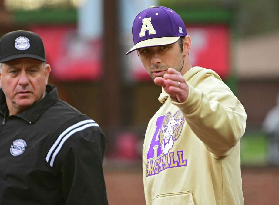 Amsterdam coach Robby Hisert goes over the boundaries with an umpire before a baseball game against Averill Park on Tuesday, May 7, 2019 in Amsterdam, N.Y. (Lori Van Buren/Times Union) Photo: Lori Van Buren / 20046857A