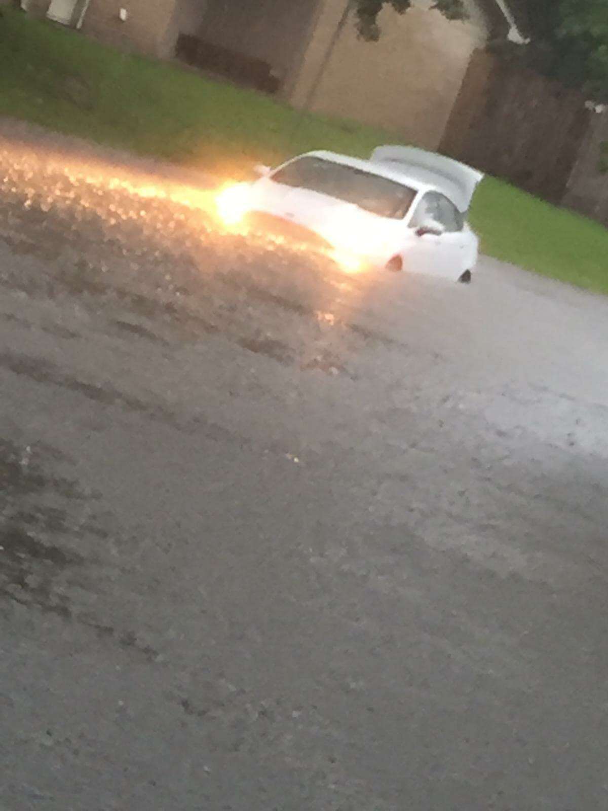 A stalled car that Javier Osornio spotted while he was driving into Kingwood on Tuesday.