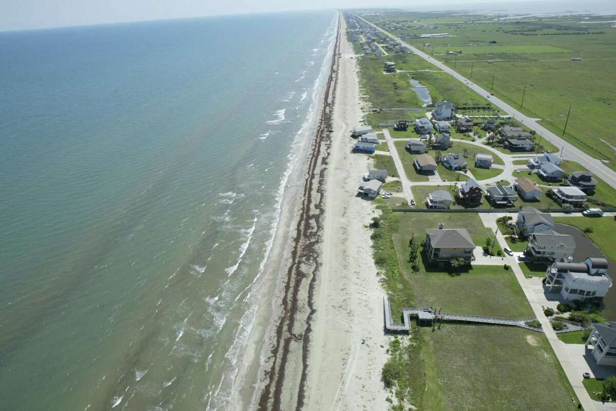 Jamaica Beach, shown in this June 2, 2005 aerial, is not protected by Galveston’s seawall. The Texas Department of Transportation plans to elevate FM 3005 to keep it above some high tides.