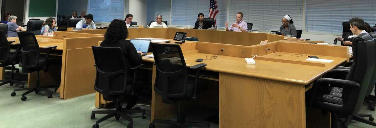 Board of Education President Andy George spoke at the board's May 7 meeting in the Stamford Government Center.