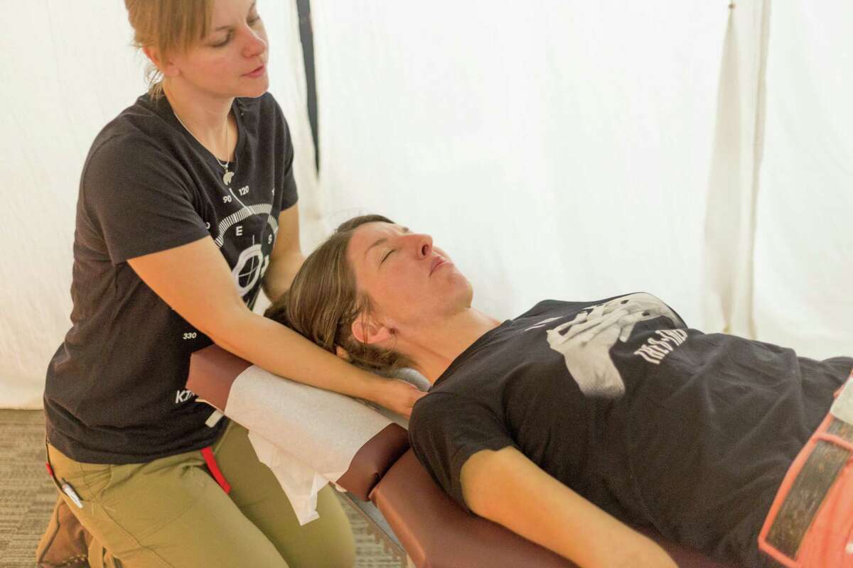 Clincians at a previous O+ Festival provide health checks at the event. (Stefan Lisowski)
