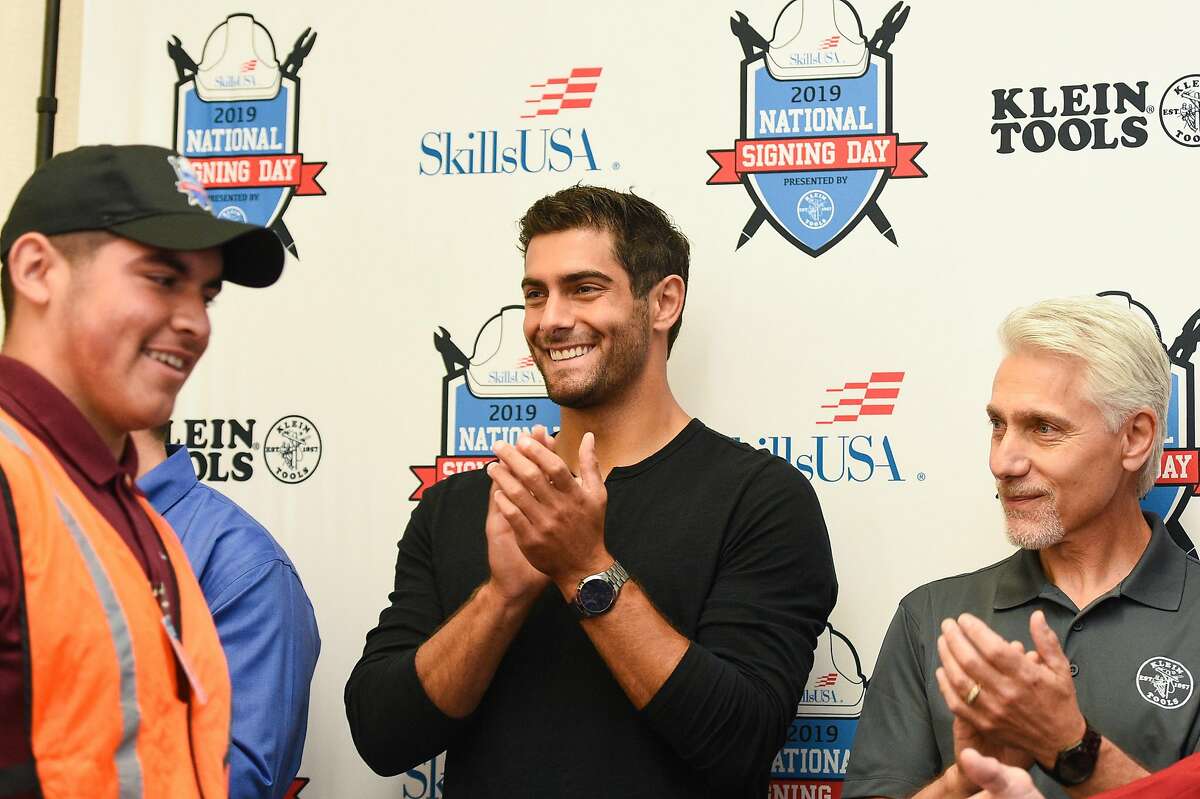 San Francisco 49ers quarterback Jimmy Garoppolo and his father Tony, a former electrician, attend the Inaugural National Signing Day celebrating high school seniors entering skilled trades at Silicon Valley Career Technical Education in San Jose on Monday May 8, 2019.