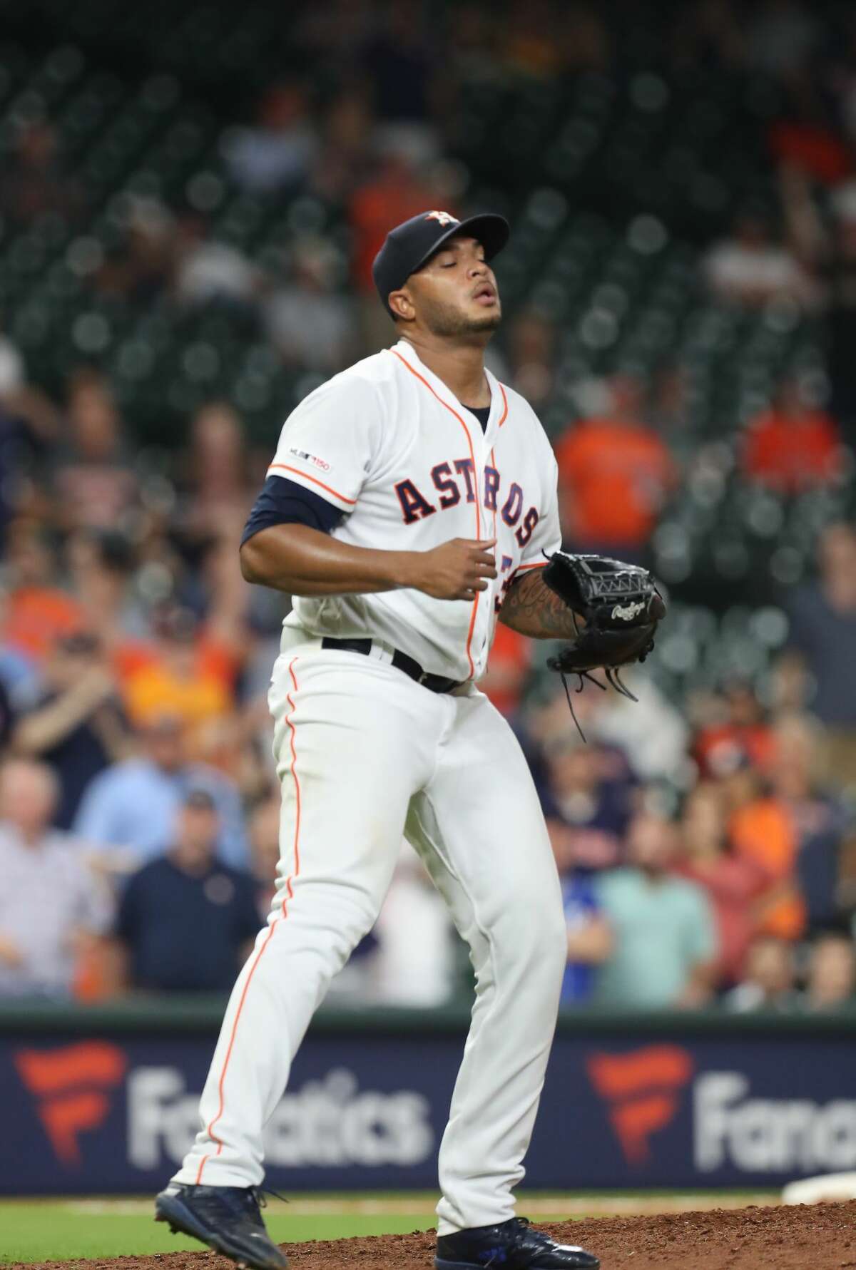 Houston Astros relief pitcher Josh James (39) reacts to making the final out during the an MLB baseball game at Minute Maid Park Wednesday, May 8, 2019, in Houston.