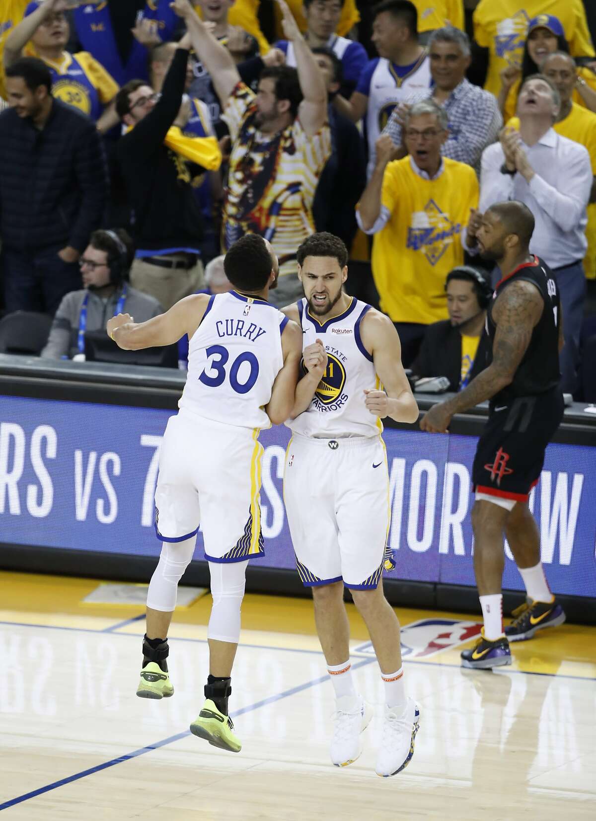 Golden State Warriors Stephen Curry and Klay Thompson react in the fourth quarter during game 5 of the Western Conference Semifinals between the Golden State Warriors and the Houston Rockets at Oracle Arena on Wednesday, May 8, 2019 in Oakland, Calif.