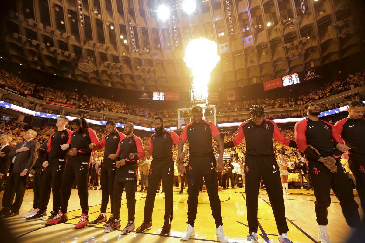 Houston Rockets line up for the National Anthem before Game 5 of the NBA Western Conference semifinals against Golden State Warriors at Oracle Arena on Wednesday, May 8, 2019, in Oakland.