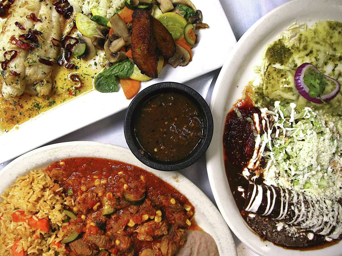 House specialties at SoLuna include huachinango al ajillo, top left, Enchiladas MiraSol and calabacita con carne de puerco.