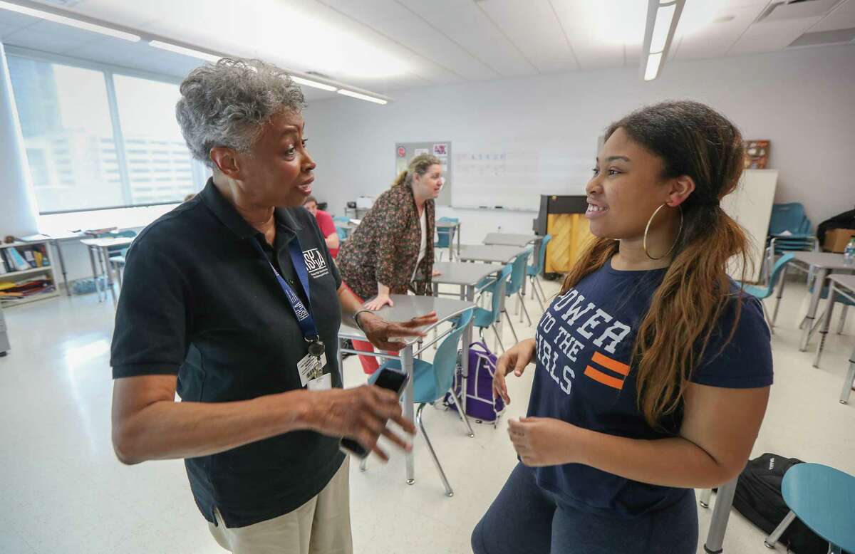 HSPVA Vocal Department Chair, Pat Bonner, talks with Keri Palmer an junior, Thursday, May 2, 2019, in Houston. Bonner also taught Palmer's mother, Tiffany Landerth-Palmer, Class of 1998.