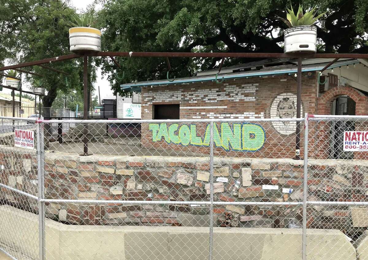 Chain-link fencing encircles the former home of Viva Tacoland at 103 W. Grayson St. The business closed in late April.