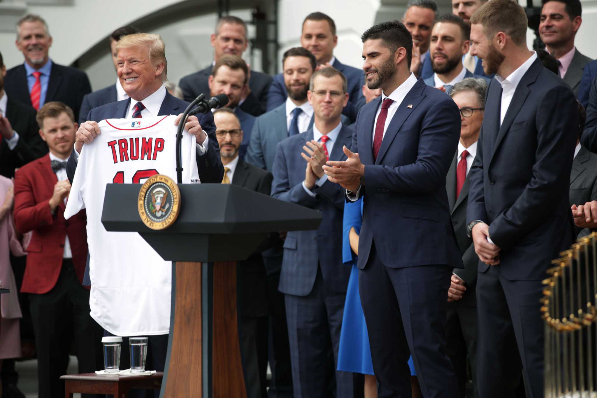 Against backdrop of controversy, Red Sox honored by Trump