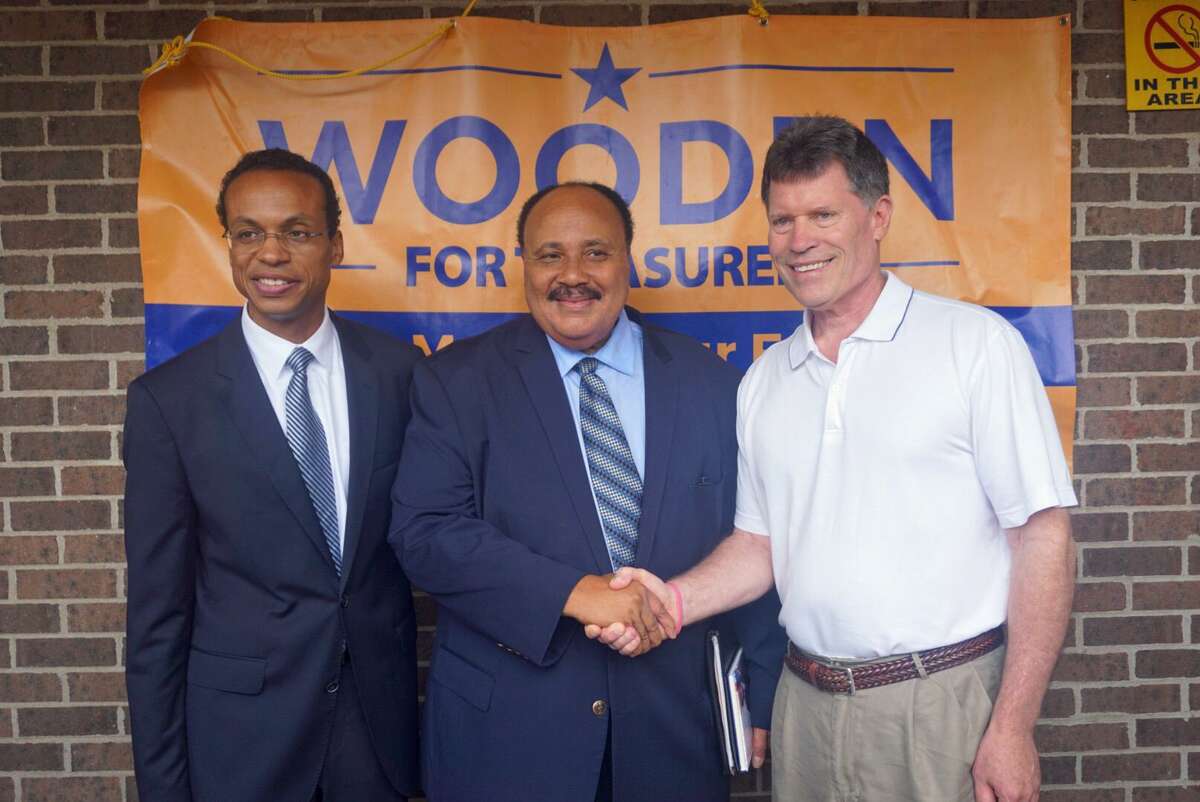 State Sen. John Fonfara, shown at right with Treasurer Shawn Wooden, left, and Martin Luther King III during the 2018 campaigns, is working with Gov. Ned Lamont and other top legislators on a plan to replace the state income tax with a payroll tax, saving Connecticut residents more than $1 billion.