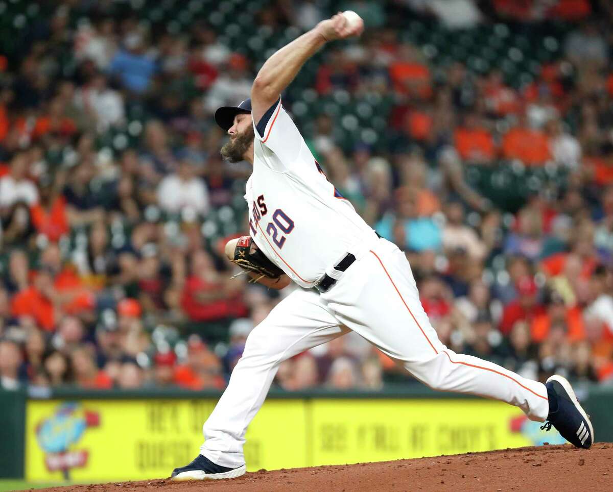 Houston Astros starting pitcher Wade Miley (20) throws a strike out pitch to Texas Rangers Joey Gallo for his 1,000th career strike out during the second inning of a major league baseball game at Minute Maid Park on Thursday, May 9, 2019, in Houston.