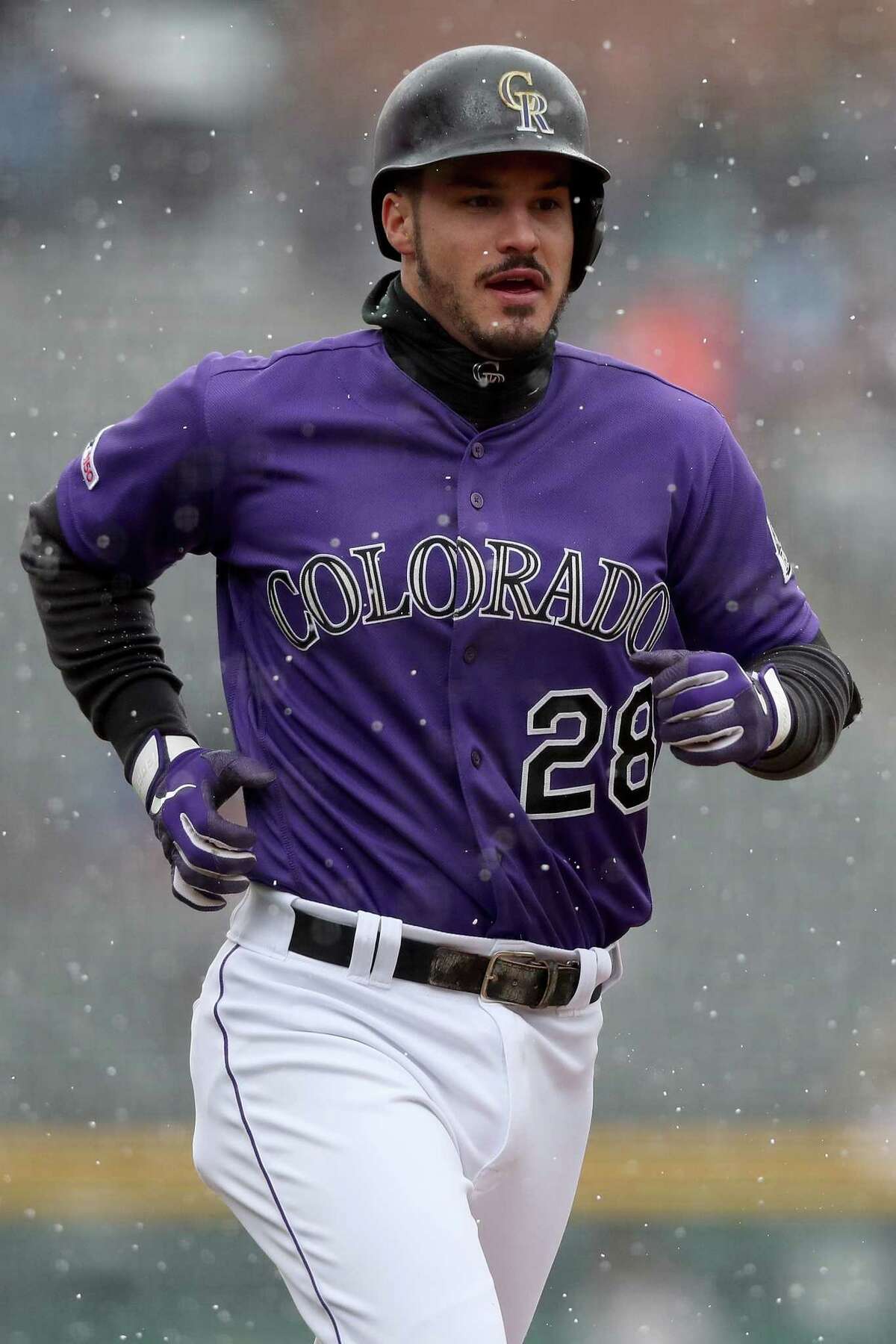 DENVER, COLORADO - MAY 09: Nolan Arenado #28 of the Colorado Rockies circles the bases after hitting a 2 RBI home run in the first inning against the San Francisco Giants at Coors Field on May 09, 2019 in Denver, Colorado. (Photo by Matthew Stockman/Getty Images)