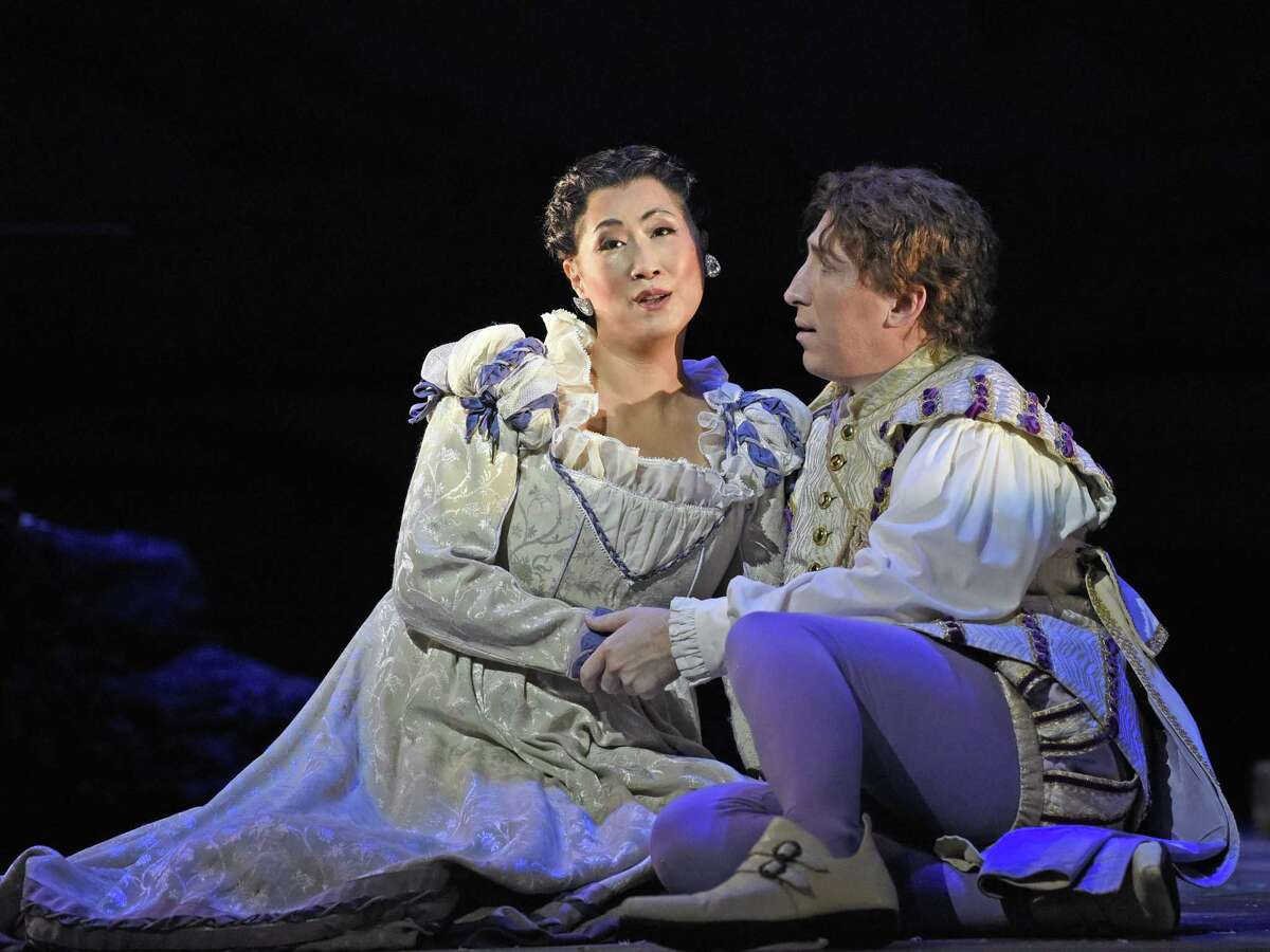 Soprano Yunah Lee, from left, and tenor Joshua Dennis play Marguerite and the title character, respectively, in Opera San Antonio’s production of “Faust.”
