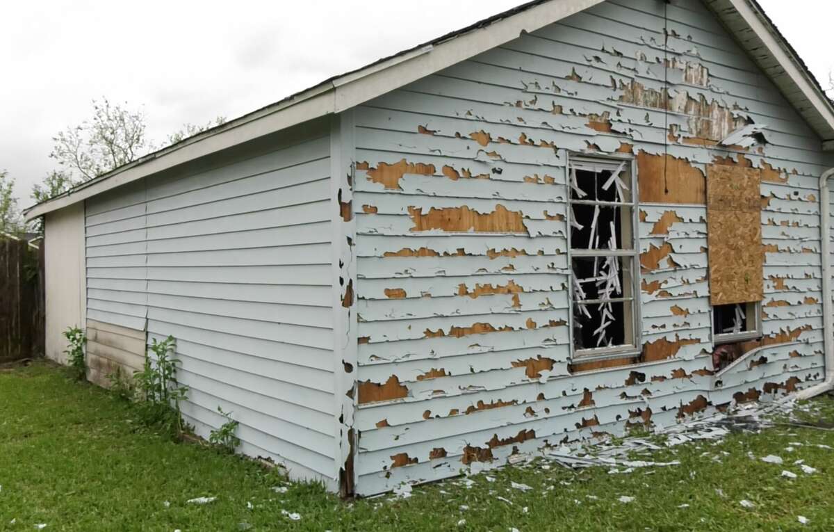 A home is seen damaged from baseball-sized hail northeast of Houston on Friday, May 10, 2019.