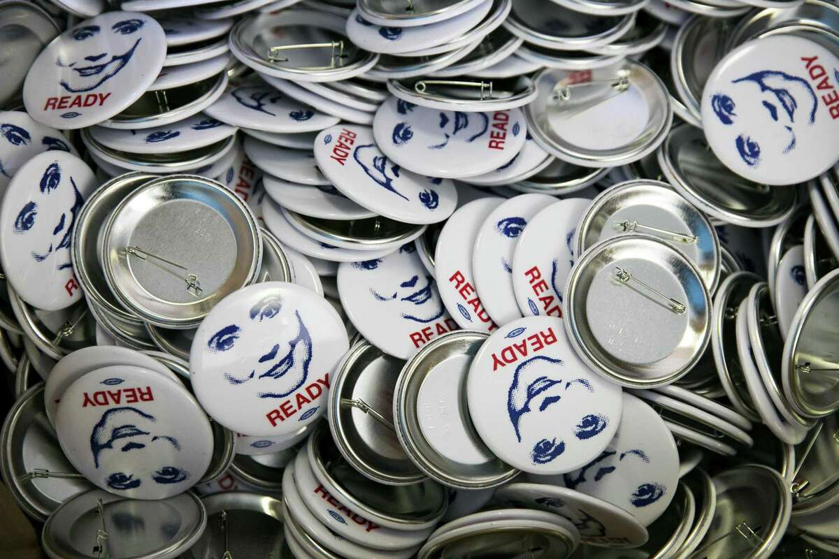Buttons promoting Democratic presidential candidate Hillary Clinton, in a photo from July 26, 2013. (Drew Angerer/The New York Times)