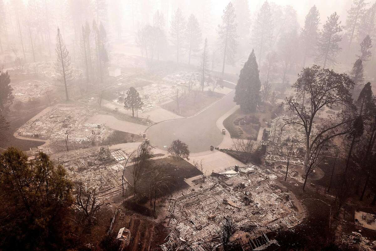 The flattened homes at Mountain Meadow Court at Country Oak Drive, Thursday, Nov. 15, 2018, in Paradise, Calif. The U.S. Senate is at an impasse over a federal disaster aid bill, which includes badly needed aid for fire victims in California.