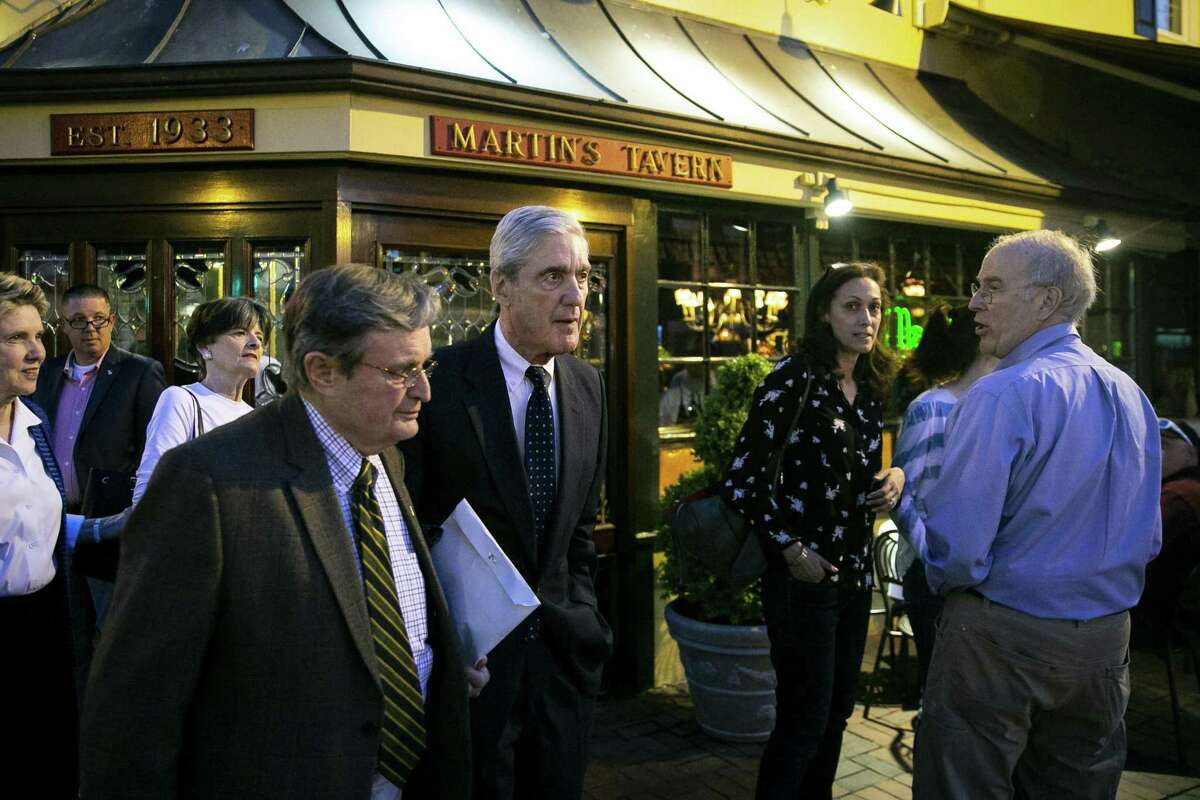 The report by Robert Mueller — second from left, seen in Georgetown on May 6 — is all Congress needs to make an impeachment decision after the special counsel decline o decide whether the president was guilty of a crime.