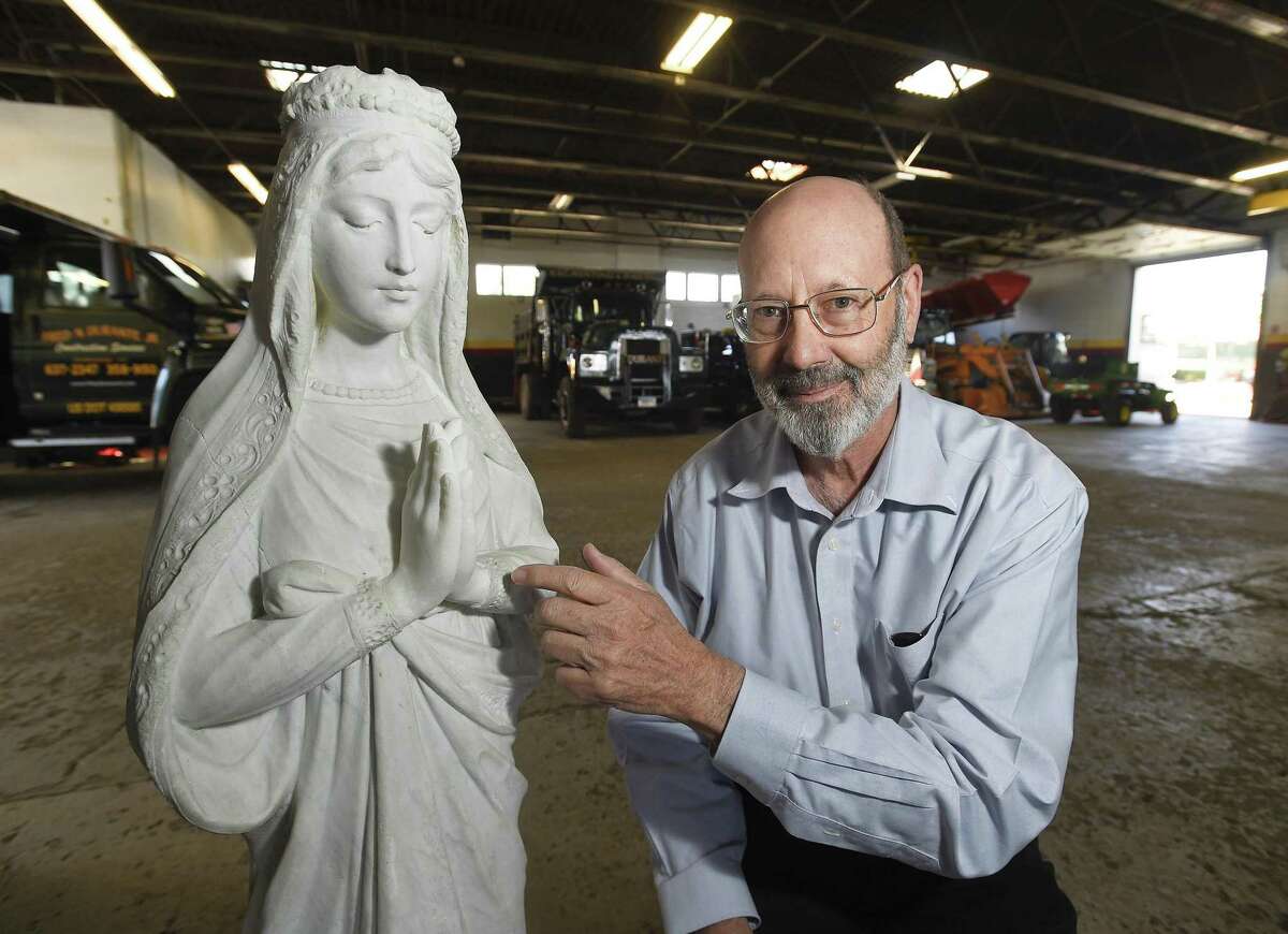 Jeffrey Damberg of Greenwich, a local sculptor and fine artist talks about the restoration work he did on a statue of Mary at the landscaping facilities of Fred Durante Jr on May 8, 2019 in Stamford, Connecticut. A crew from Durante's landscaping company dug up the figurine in Riverside. For the past several months, Damberg has spent countless hours restoring the statue, which will be unveiled on Mother's Day at St. Catherine of Siena in Riverside.