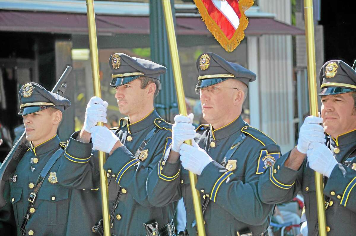 Torrington Police officers march in the city's 2015 Memorial Day Parade.