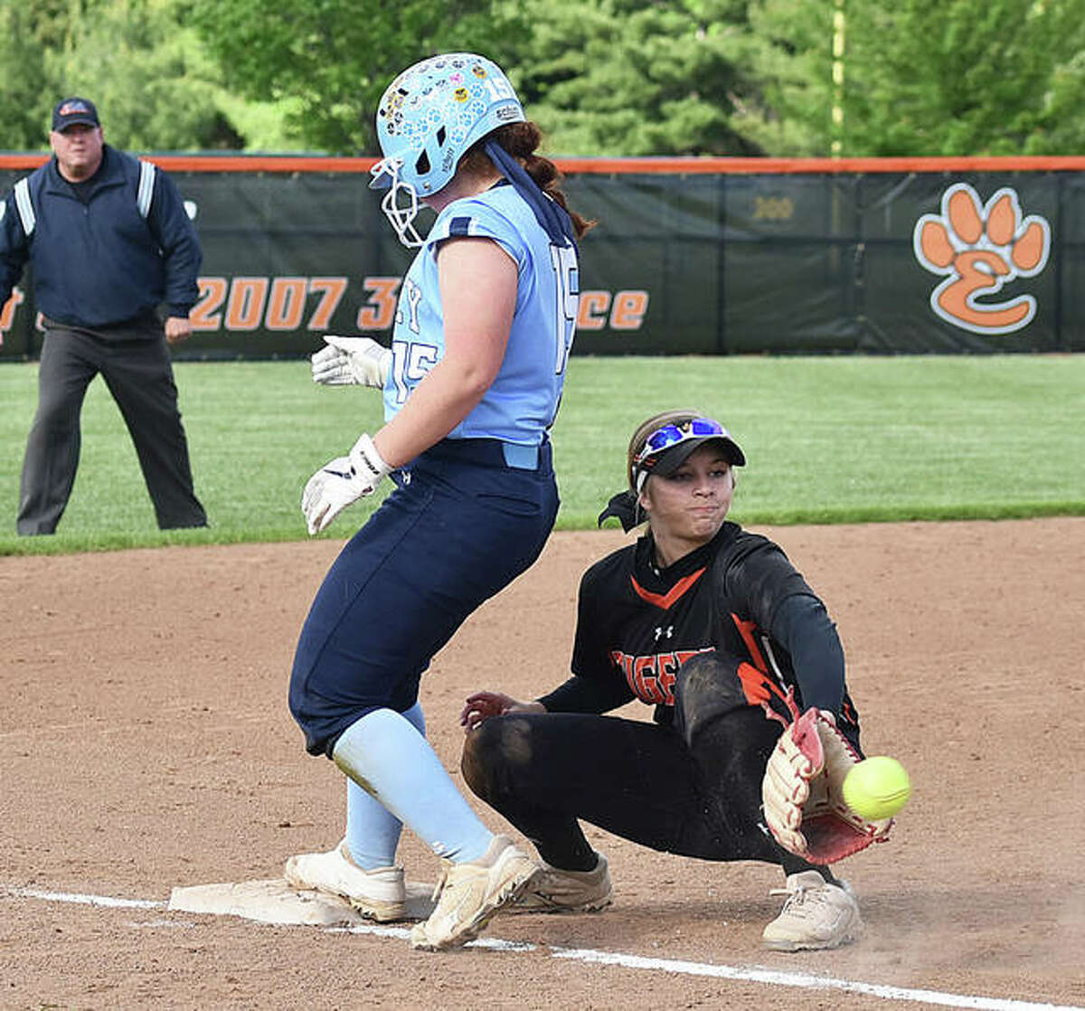 Edwardsville third baseman Lexi Gorniak catches a pickoff throw from catcher Moe Kastens in the fifth inning.