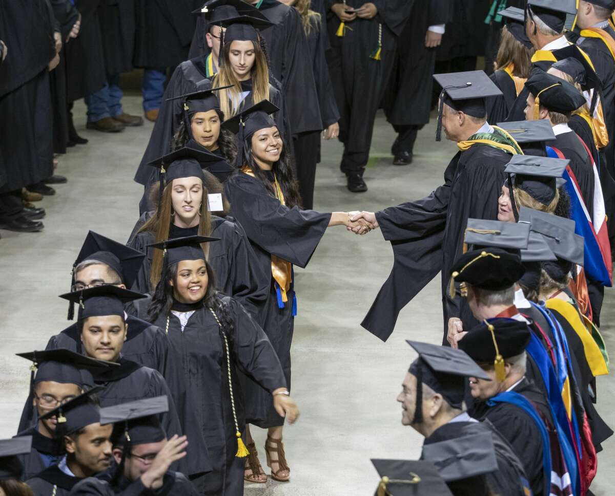 Midland College students process in 05/10/19 evening at the Chaparral Center for the 46th Commencement Ceremony. Tim Fischer/Reporter-Telegram