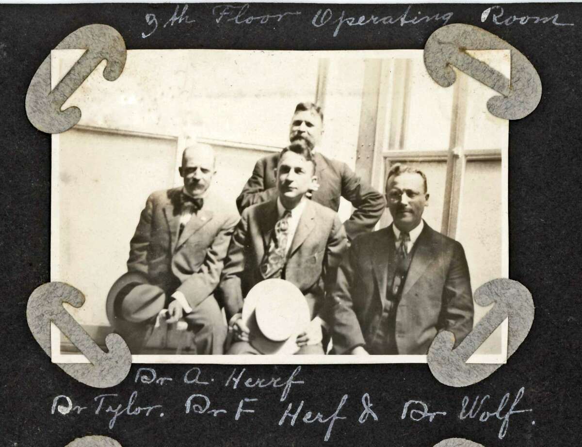Shown in this snapshot in a 1919 scrapbook are four doctors at Santa Rosa Hospital, including Adolph Herff and Ferdinand Ludwig Herff. The hospital’s well-known doctors lent it prestige and served as instructors at the Santa Rosa School of Nursing. The scrapbook was compiled by Maria Cristina Camargo, a student who graduated that year from the nursing school.