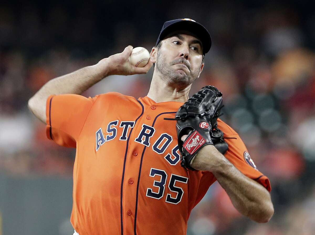 Houston Astros starting pitcher Justin Verlander throws to a Texas Rangers batter during the first inning of a baseball game Friday, May 10, 2019, in Houston. (AP Photo/Michael Wyke)