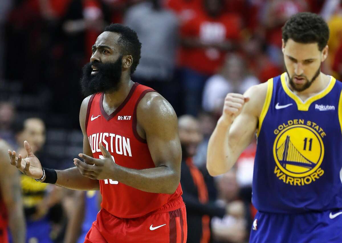 Houston Rockets guard James Harden (13) and Golden State Warriors guard Klay Thompson (11) react to a play during the second half of Game 6 of the NBA Western Conference semifinals at Toyota Center on Friday, May 10, 2019, in Houston. The Warriors eliminated the Rockets with a 118-113 win, to take the series 4-2.