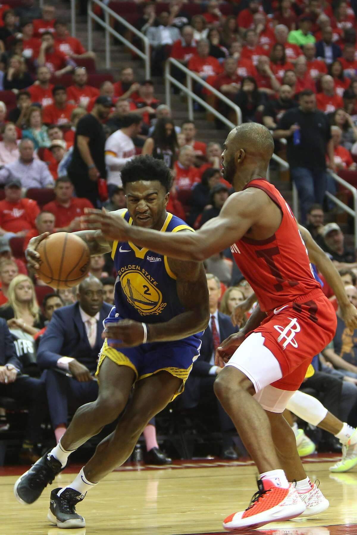 Golden State Warriors forward Jordan Bell drives to the basket against Houston Rockets guard Chris Paul in the third quarter during Game 6 in the Western Conference Semifinals against the Houston Rockets at Toyota Center in Houston, TX on Friday May 10, 2019.