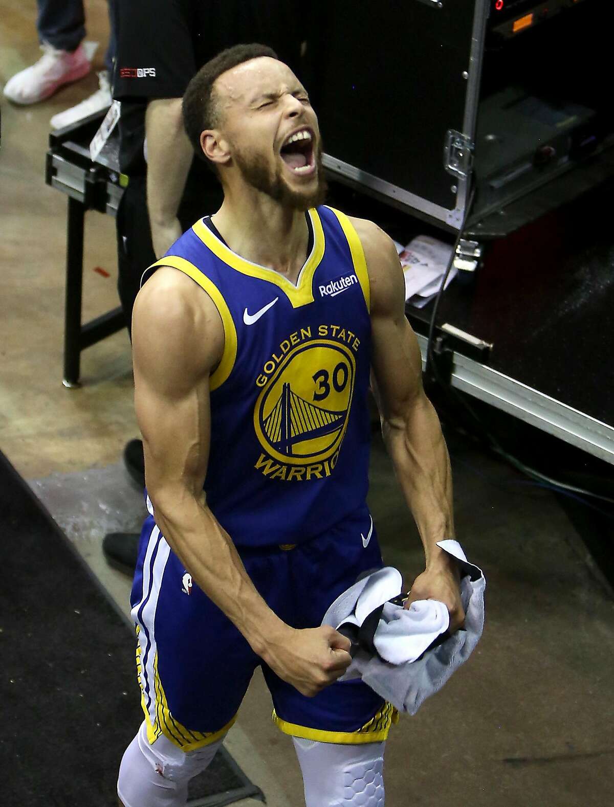 Golden State Warriors guard Steph Curry celebrates on his way to the locker room after a Game 6 victory in the Western Conference Semifinals against the Houston Rockets at Toyota Center in Houston, TX on Friday May 10, 2019.