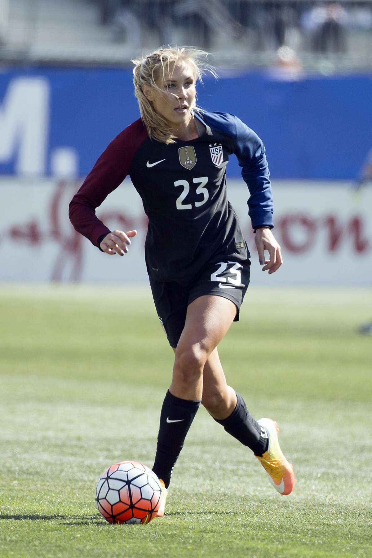 FILE - In this April 10, 2016, file photo, United States' Allie Long (23) dribbles the ball during the second half of an international friendly soccer match against Colombia in Chester, Pa. Long is among 23 players named to the team that was getting in its last three exhibition games this month before heading to Europe for the Women’s World Cup, which opens June 7. (AP Photo/Chris Szagola, File)