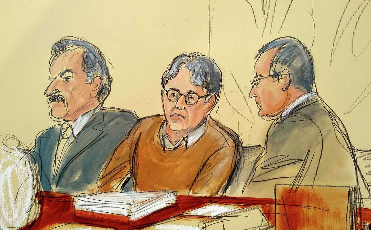 In this courtroom drawing, defendant Keith Raniere, center, is seated between his attorneys Paul DerOhannesian, left, and Marc Agnifilo during the first day of his sex trafficking trial, Tuesday, May 7, 2019. Raniere, the former leader of the self help group called NXIVM, has pleaded not guilty to the charges that he turned his followers into sex slaves. (Elizabeth Williams via AP)