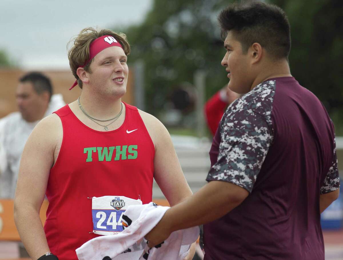 Patrick Piperi of The Woodlands talks with Angel Robles of Summer Creek while competing in the 6A boys shot put during the UIL State Track & Field Championships at Mike A. Myers Stadium, Saturday, May, 11, 2019, in Austin.