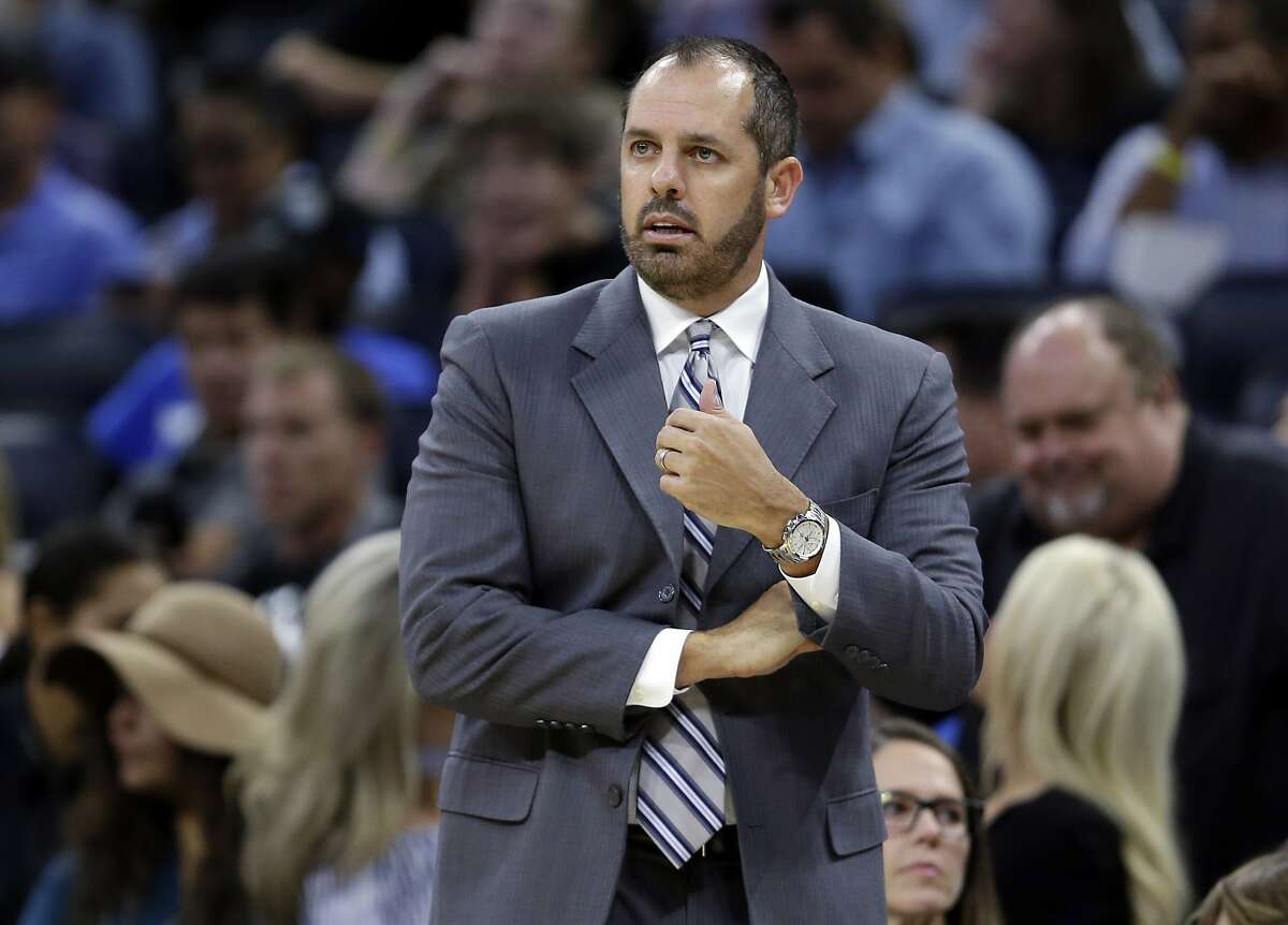 FILE - In this Oct. 24, 2017, file photo, Orlando Magic coach Frank Vogel watches his team play the Brooklyn Nets during the first half of an NBA basketball game in Orlando, Fla. A person familiar with the search says the Los Angeles Lakers have hired Vogel as coach. The person spoke to The Associated Press on condition of anonymity Saturday, May 11, because the hiring has not been announced. Vogel flew to Los Angeles on Thursday. The 45-year old Vogel did not coach last season following two years with the Magic. (AP Photo/John Raoux, File)
