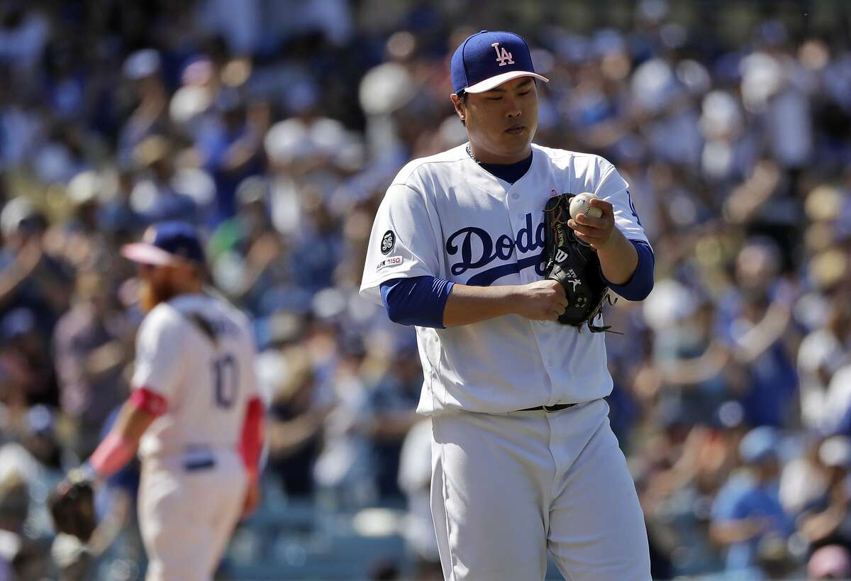 Los Angeles Dodgers starting pitcher Hyun-Jin Ryu pauses on the mound after giving up a double to Washington Nationals Gerardo Parra during the eighth inning of a baseball game Sunday, May 12, 2019, in Los Angeles. (AP Photo/Marcio Jose Sanchez)