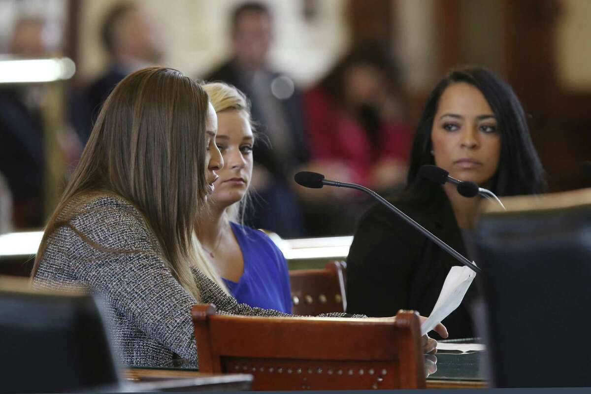 Jordan Schwikert, left, joins fellow former USA Gymnastics national team athlete Alyssa Baumann, center, and Olympian Tasha Schwikert as they testify before the Texas Senate Committee on State Affairs in favor of new language for HB 3809, Monday, May 13, 2019. The bill extends the statute of limitations for child sex assaults. The three gymnasts were victims of child sexual abuse by USA Gymnastics' Dr. Larry Nassar.