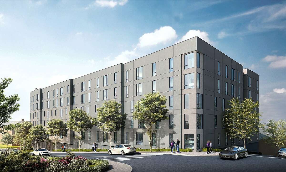 The proposed design for the 150 faculty apartments that UC-Berkeley seeks to build on what now is a parking garage. This rendering shows the view from the corner of La Loma Avenue and Ridge Road.