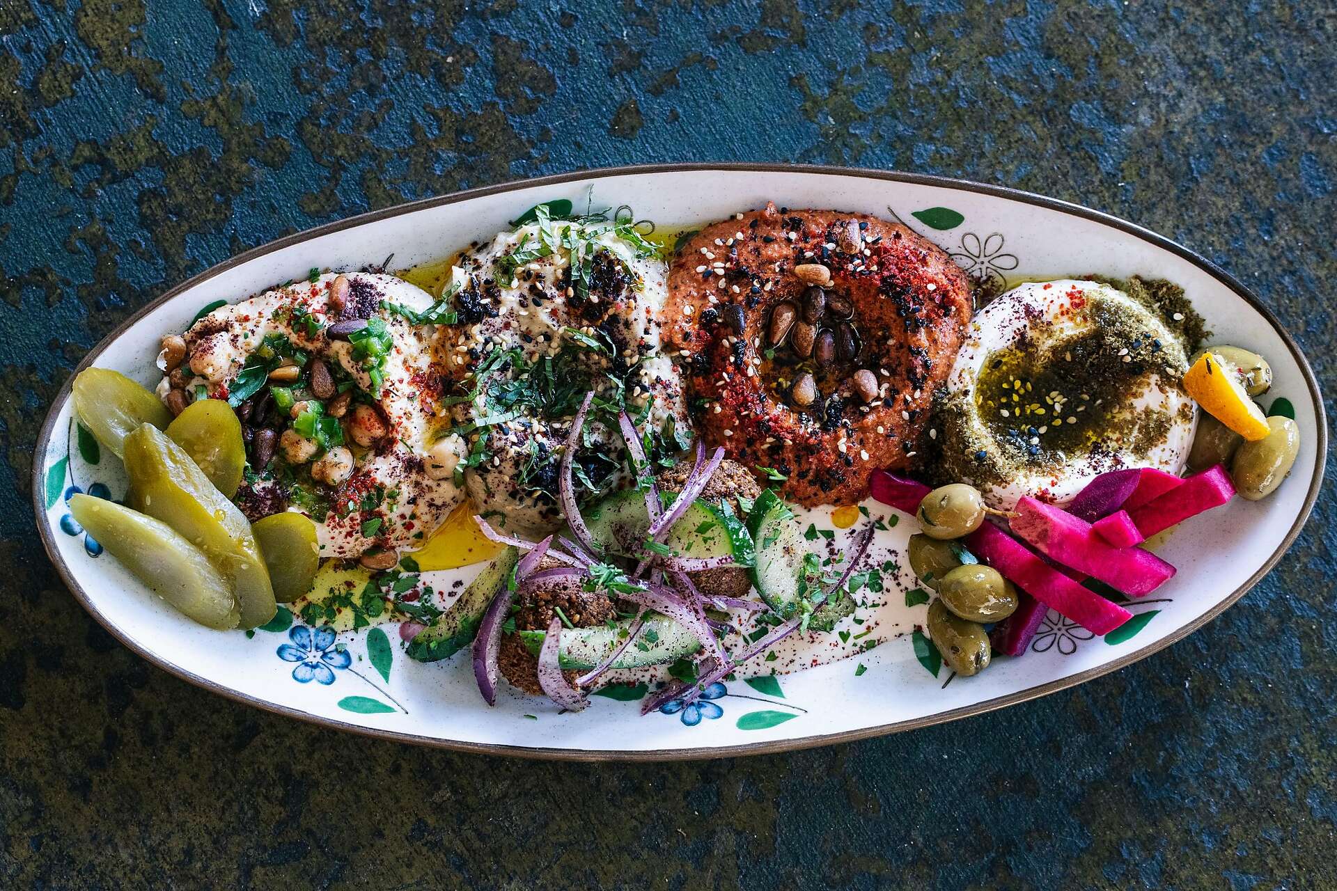 At Beit Rima, a son reinvents his father’s burger joint to showcase ...