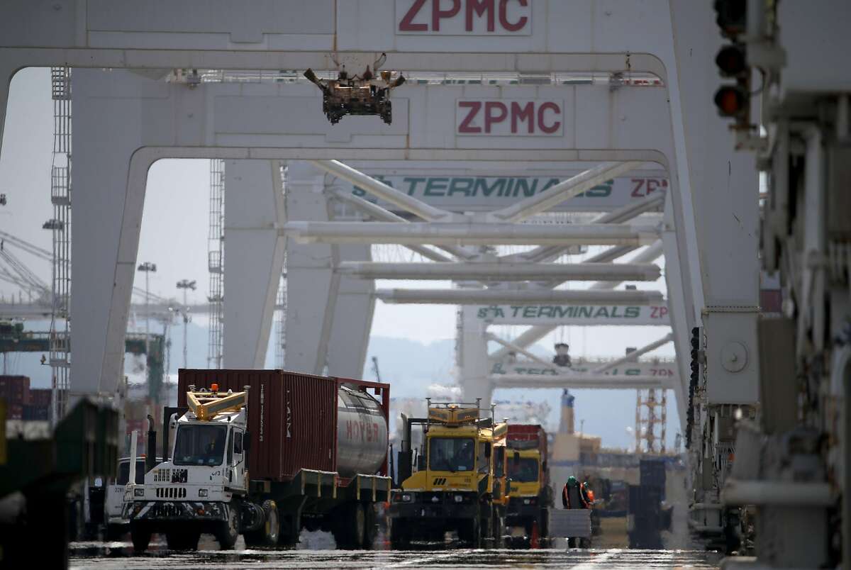 OAKLAND, CALIFORNIA - MAY 13: Containers are offloaded from a ship docked at the Port of Oakland on May 13, 2019 in Oakland, California. China retaliated to U.S. President Donald Trump's 25 percent tariffs on $250 billion of Chinese goods entering the United States with a 25 percent tariff on $60 billion of U.S. goods entering China. The Dow Jones Industrial Average plunged over 700 points on the news in morning trading. (Photo by Justin Sullivan/Getty Images)