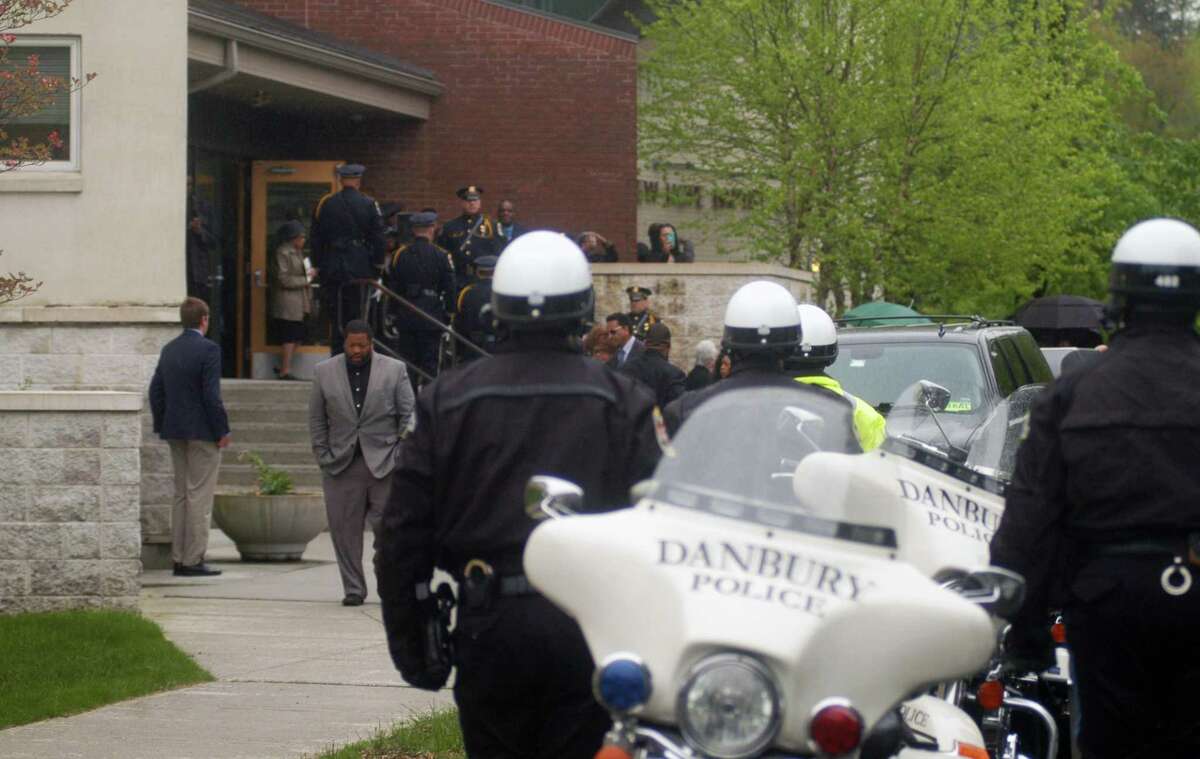 George Johnson, a retired Danbury Police Department captain, was buried with full honors Monday, May 13, 2019, including police escort from the New Hope Baptist Church to Wooster Cemetery in Danbury.