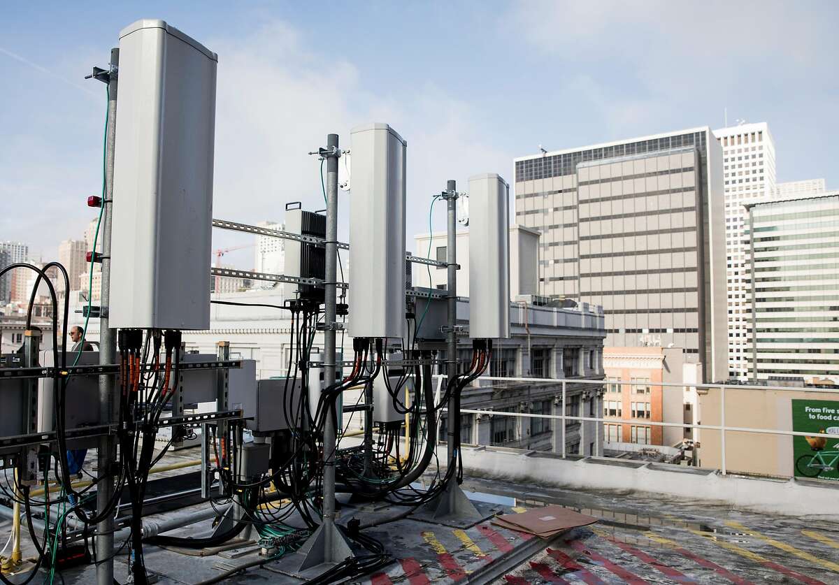 Three antennas sit on the radio access network hardware of AT&T's 5G network base station on top of the historic Argonaut Building in the Financial District of San Francisco, Calif. Thursday, Jan. 10, 2019.