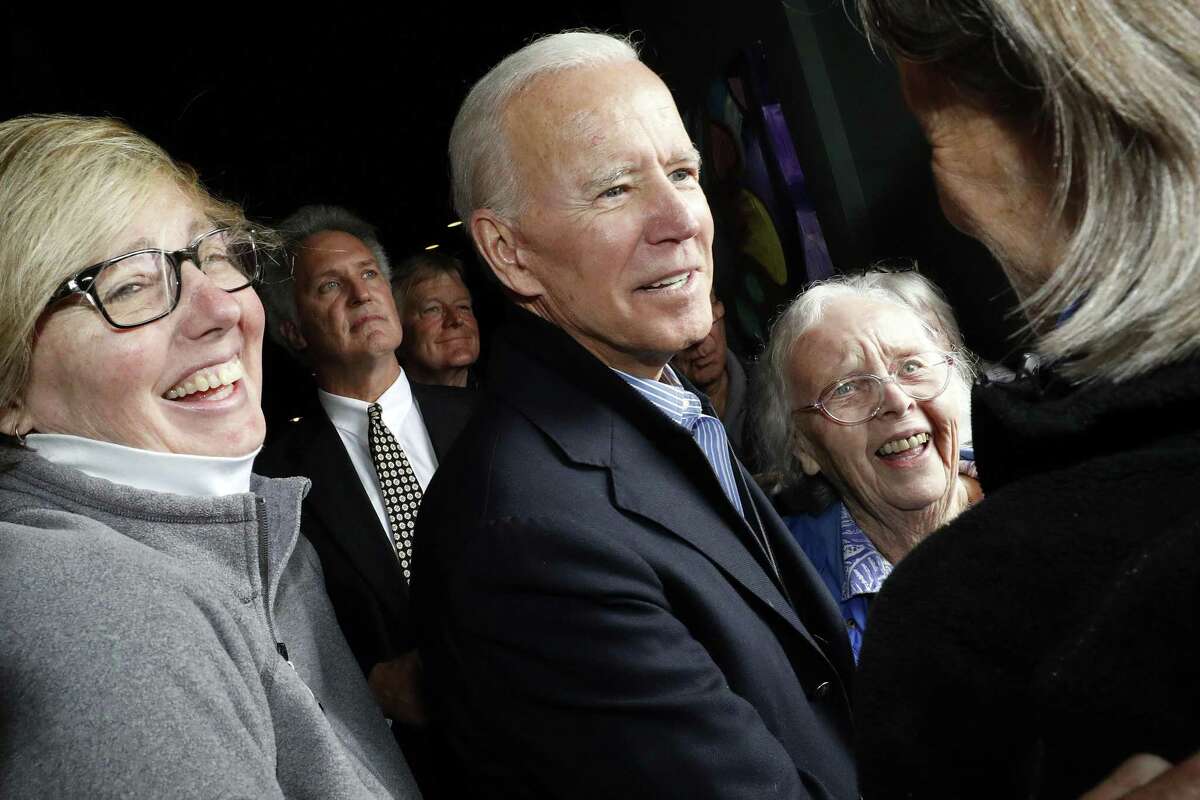 Former vice president and Democratic presidential candidate Joe Biden greets supporters during a campaign stop at the Community Oven restaurant in Hampton, N.H. on May 13, 2019.