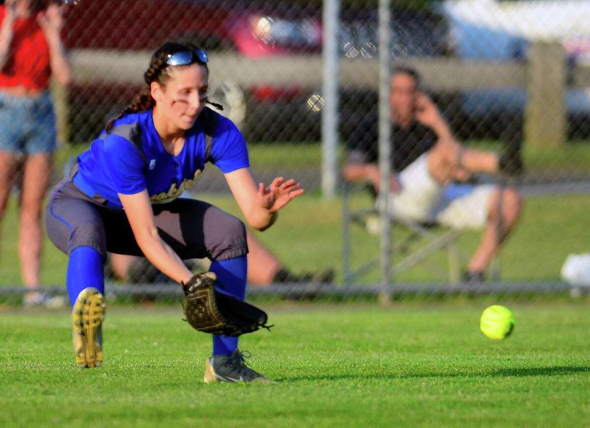 Brookfield’s Avery Katz fields a ball against Masuk during a June 8 game in West Haven.