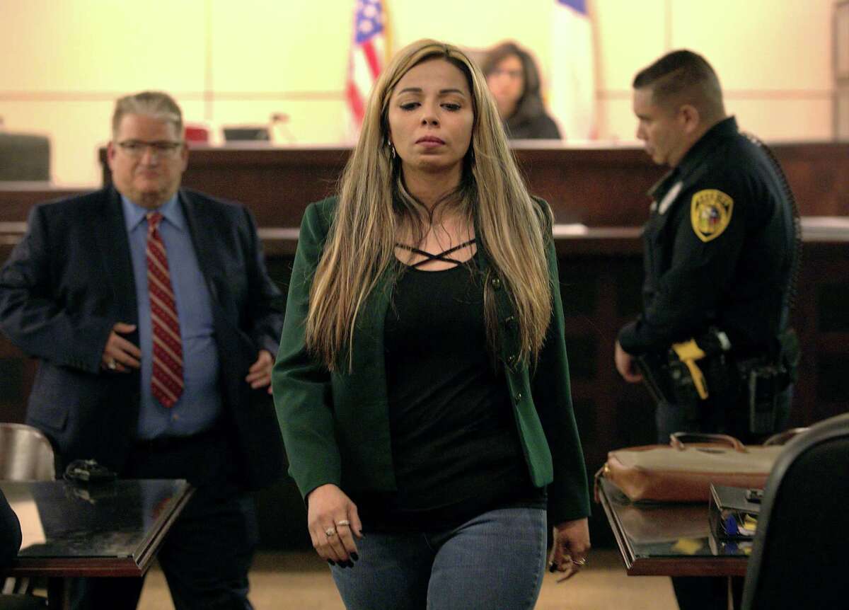 Anita Montez DeOca walks back to her seat after speaking directly to Laura Flores Messick, who was convicted of murdering her boyfriend, Chason Montez DeOca, Anita's cousin, in the 175th state District Court in the Cadena-Reeves Justice Center. Judge Catherine Torres-Stahl sentenced Messick to life in prison on Monday, May 13, 2019.