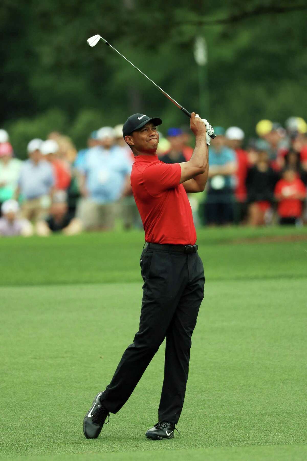 AUGUSTA, GEORGIA - APRIL 14: Tiger Woods of the United States plays an approach on the seventh hole during the final round of the Masters at Augusta National Golf Club on April 14, 2019 in Augusta, Georgia. (Photo by Mike Ehrmann/Getty Images)