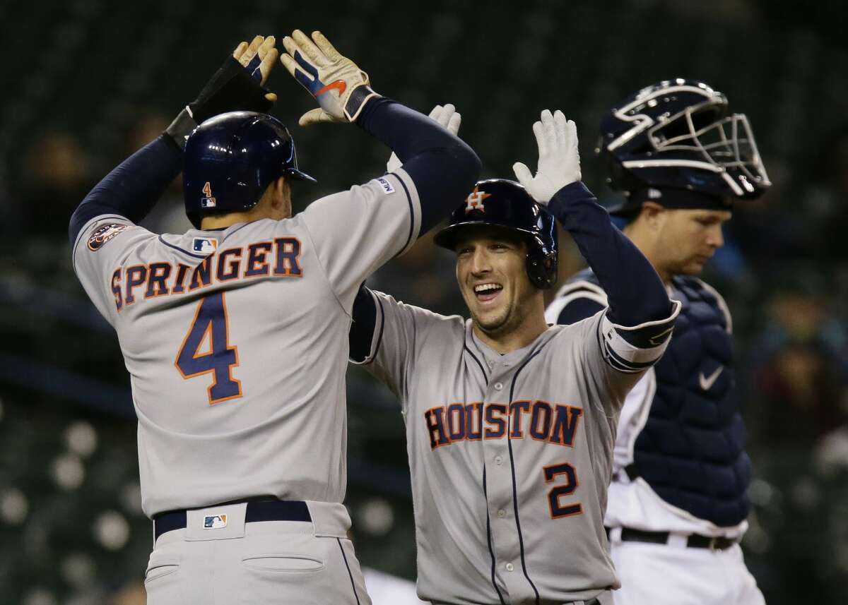 DETROIT, MI - MAY 13: Alex Bregman #2 of the Houston Astros celebrates his two-run home run with George Springer #4 against the Detroit Tigers in the ninth inning at Comerica Park on May 13, 2019 in Detroit, Michigan. The Astros defeated the Tigers 8-1. (Photo by Duane Burleson/Getty Images)